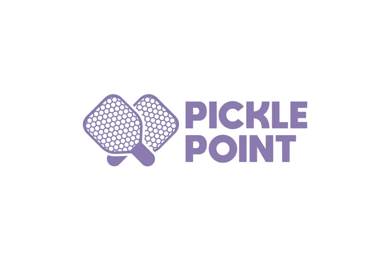 Pickle Point logo: two purple pickleball paddles beside the words PICKLE POINT on a transparent background
